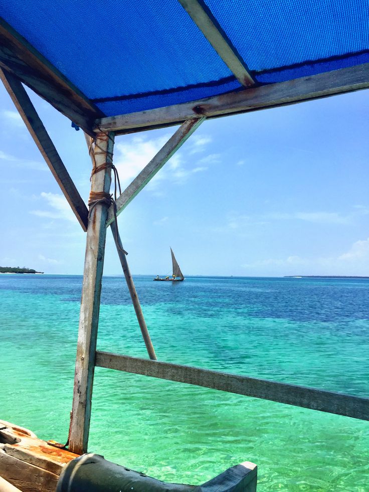 Traditional dhow at sunset off Zanzibar