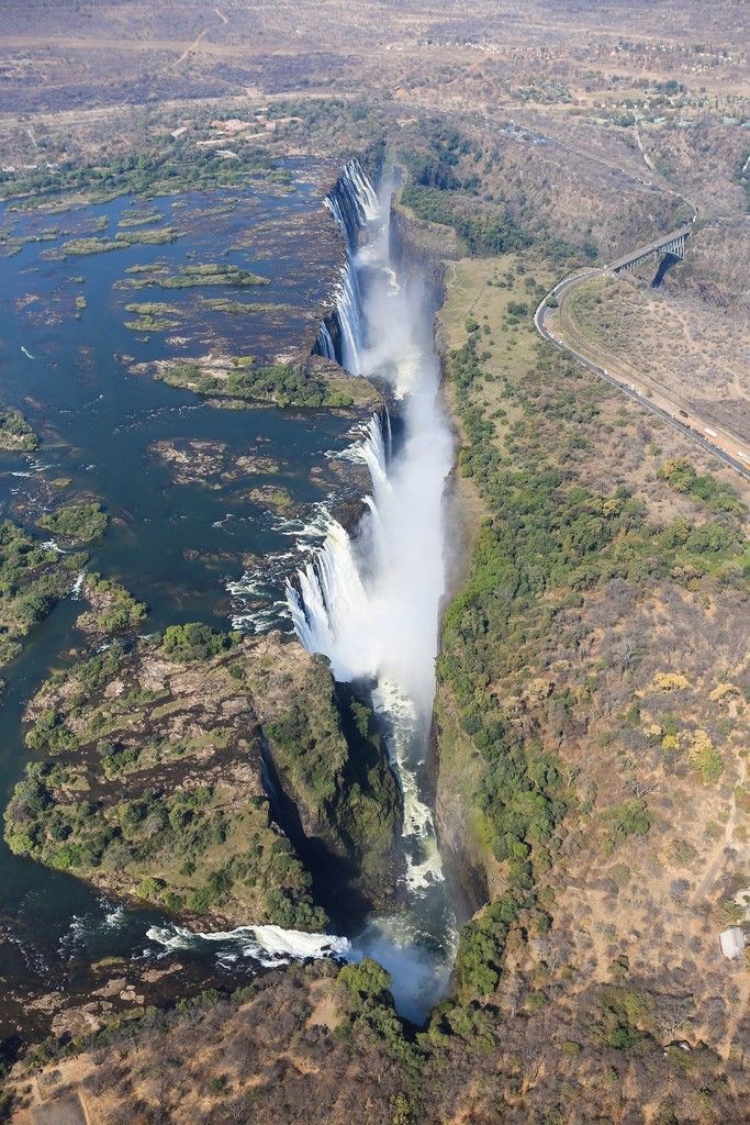 Aerial view of Victoria Falls with mist rising from the gorge